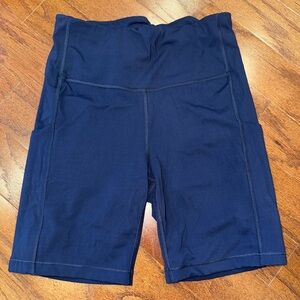 Athleta Ultimate Stash a pocket 7” short - navy